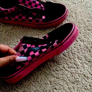 Black and pink checkered vans